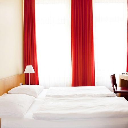 Vienna House Easy By Wyndham Rostock Hotel Room photo